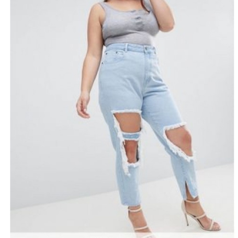 Plus size skinny jeans with extreme distressing